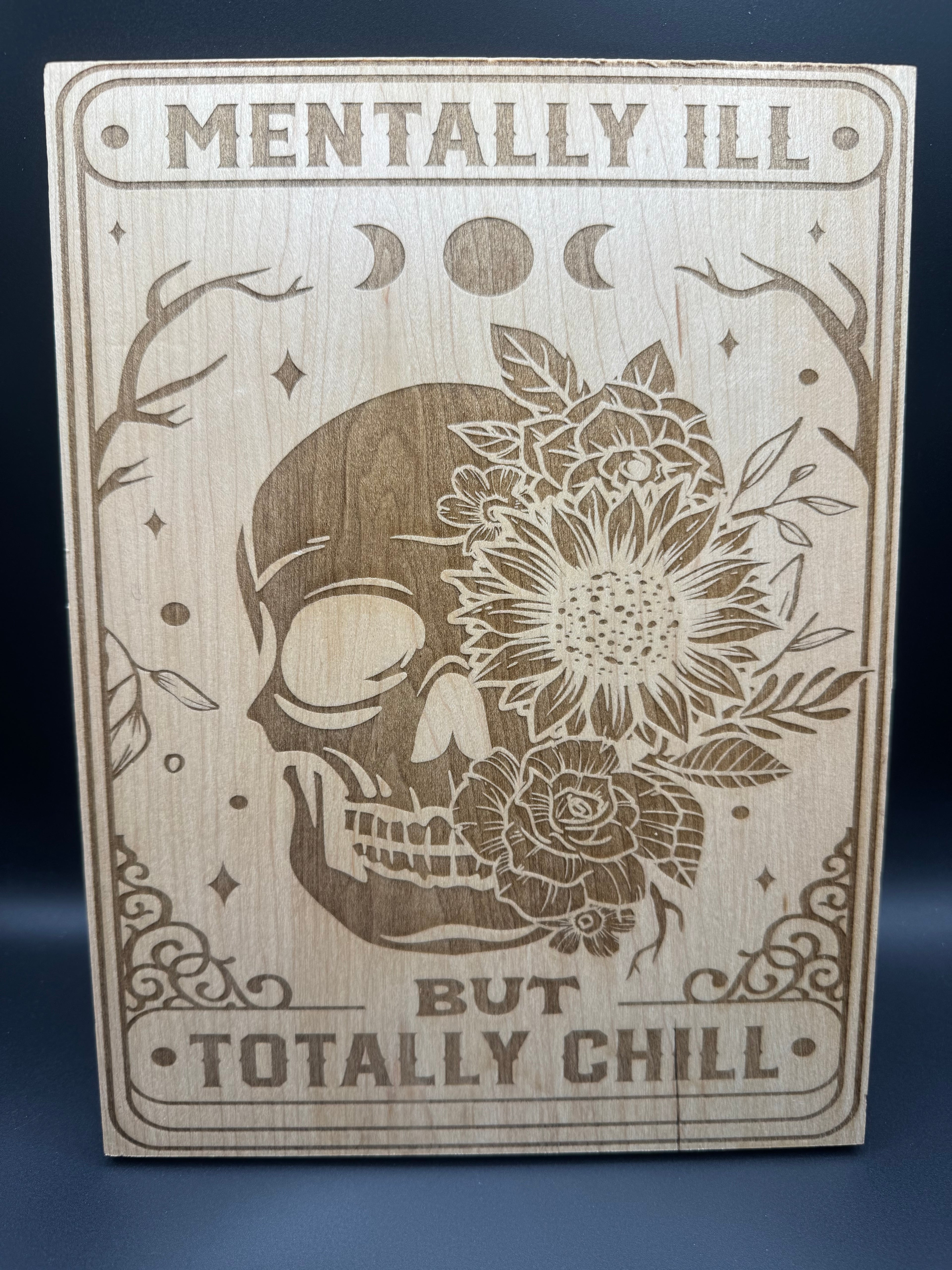 Skull engraved wooden sign (8" x 11")