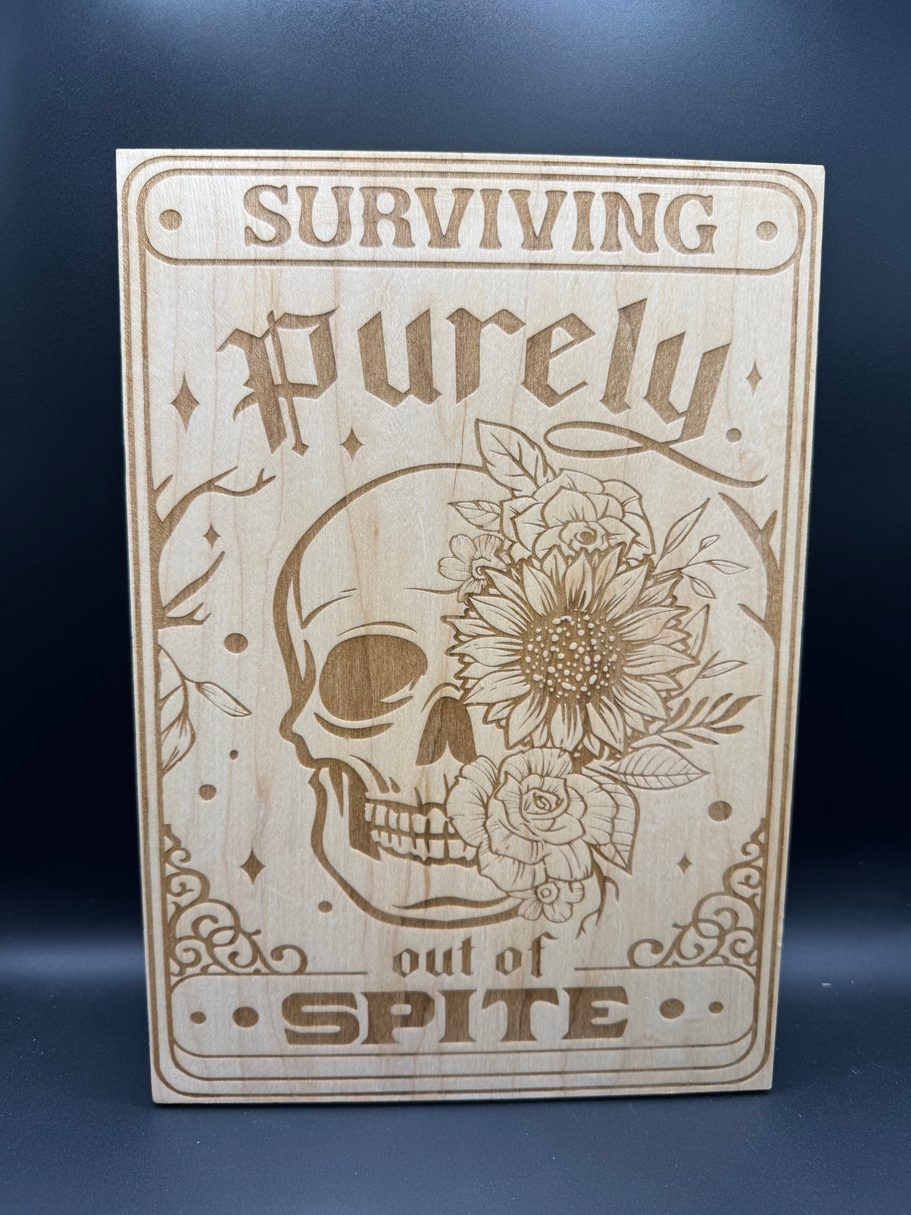 Wooden "Surviving purely out of spite" sign (8" x 10")