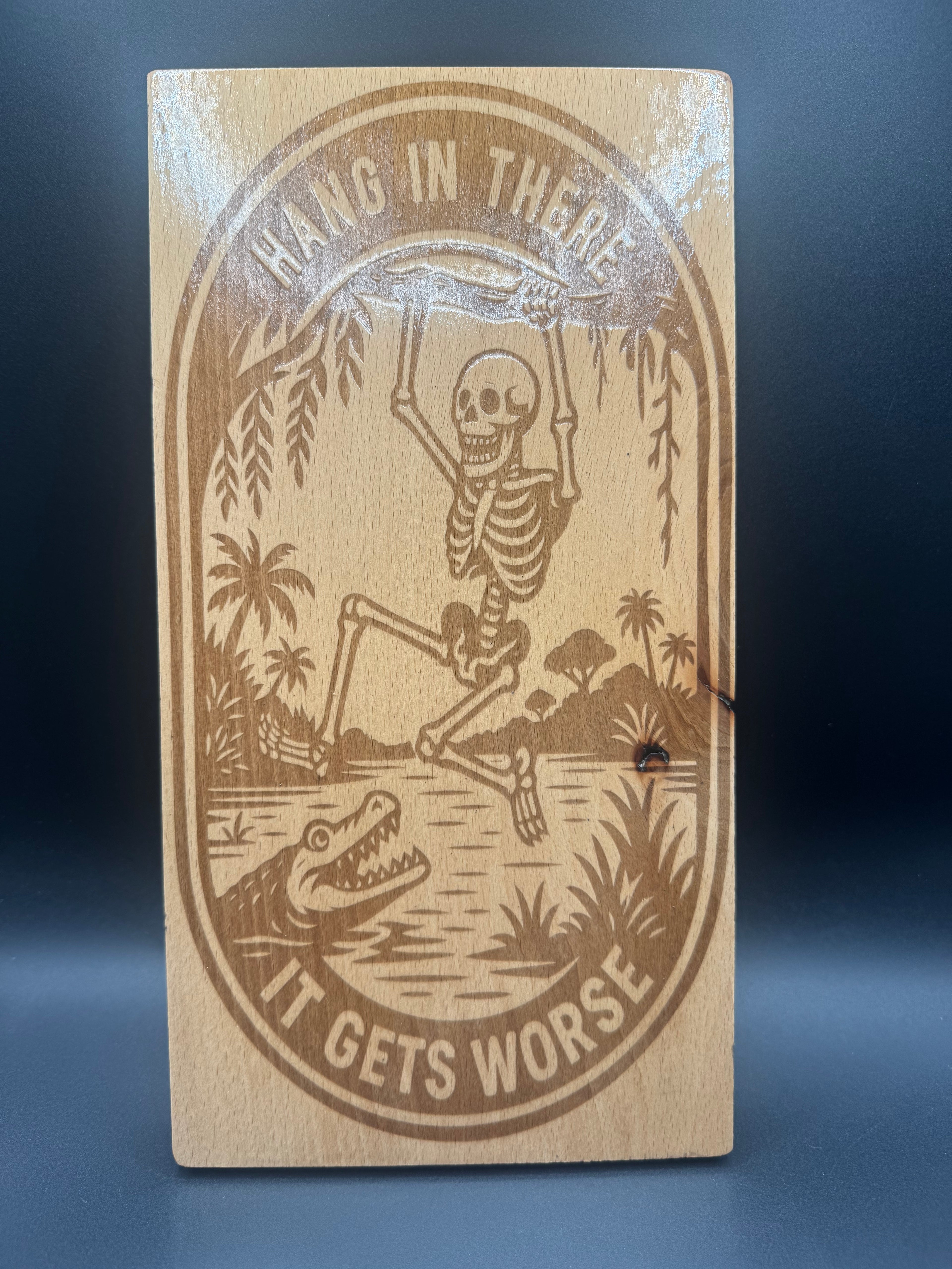 Hang in There, It Gets Worse - Skeleton Laser Engraved Wood Sign ( 6" x 11 1/2")